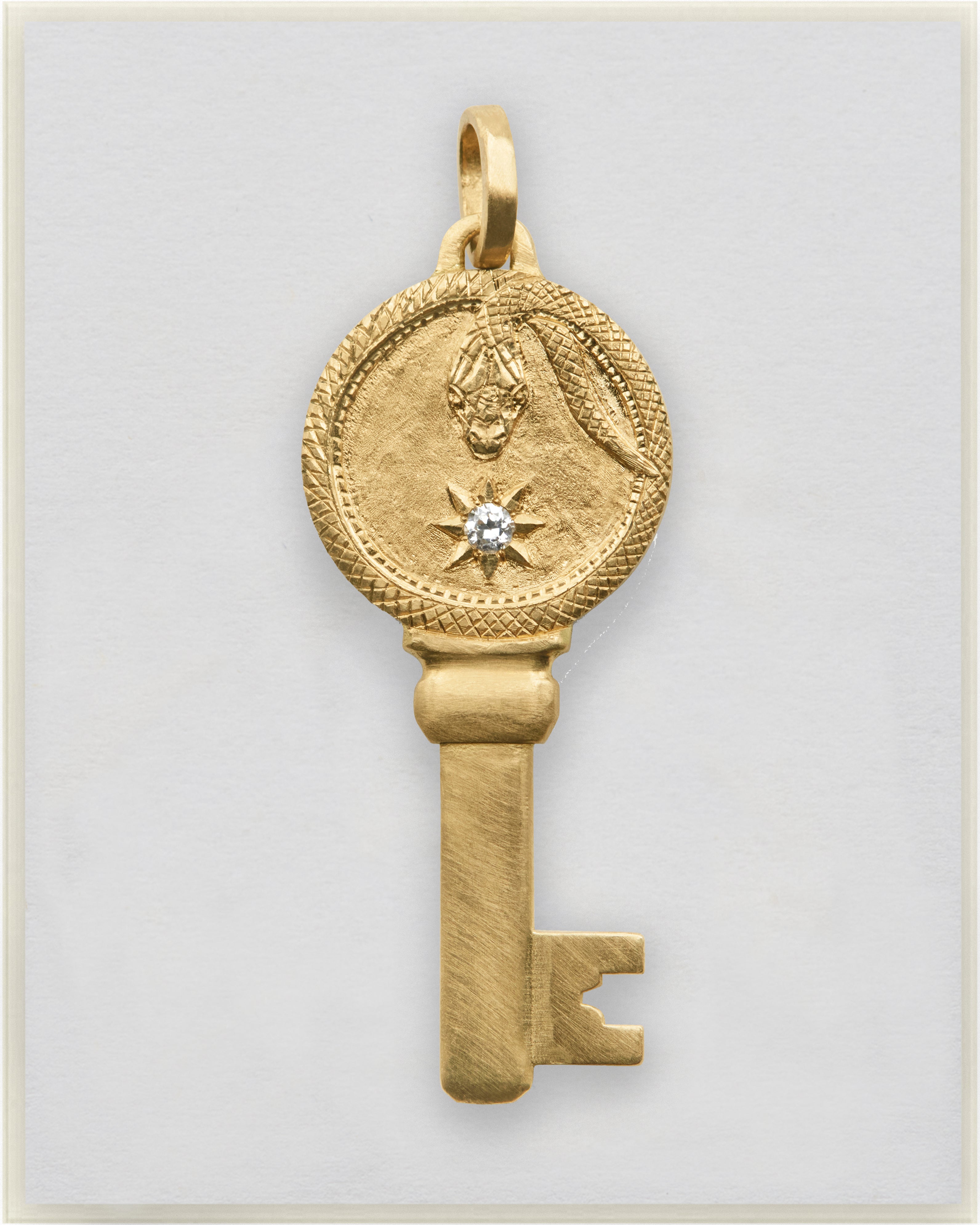 Round Engraved Snake and Diamond Key Pendant